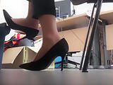 secretary in black high heels and tan nylon socks