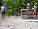  Using the beach showers naked