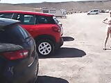 Naked pissing in beach car park 