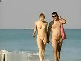 Peeping at a hot nudist couple on the beach