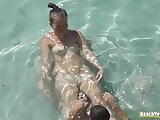 Hot naked teen teasing her boyfriend in the water